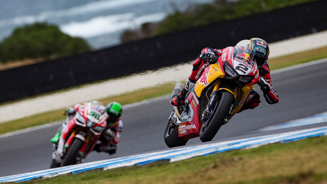 Front three-quarter facing Honda WSBK motorcycle, during the race.