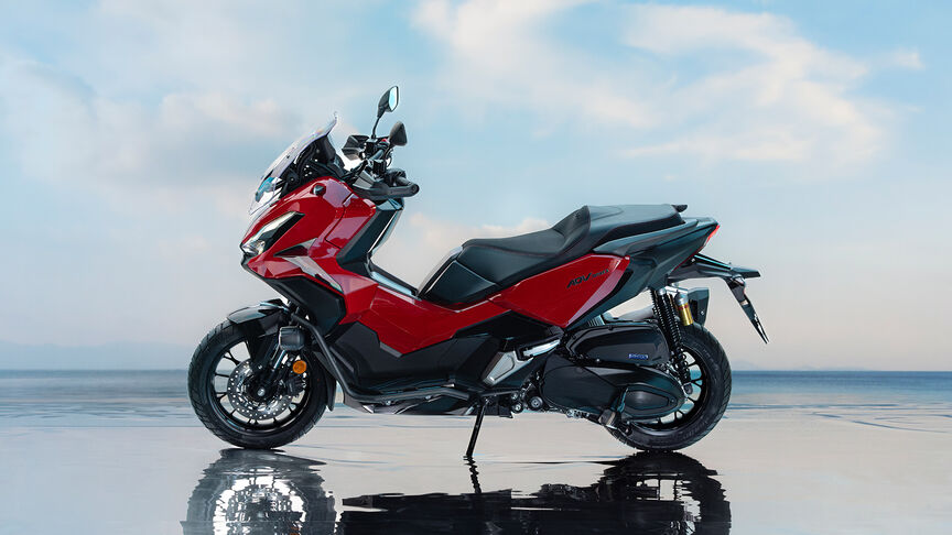 Front 3/4 Honda ADV350 in coastal location.