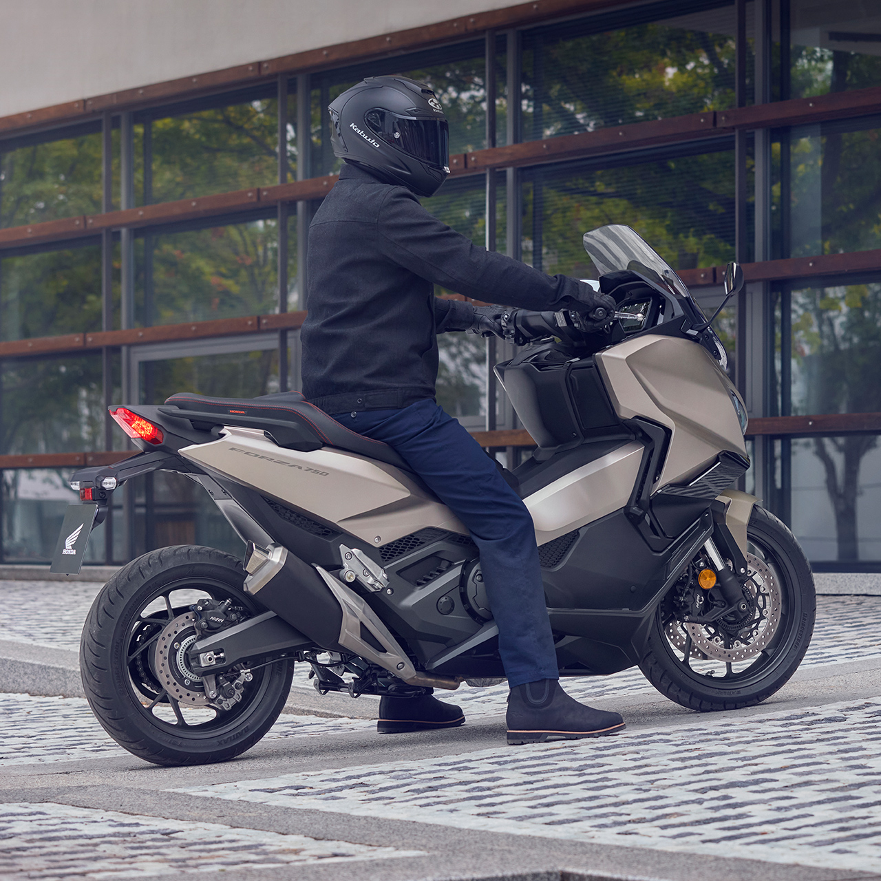 Forza 750 motorcycle parked in a street location.