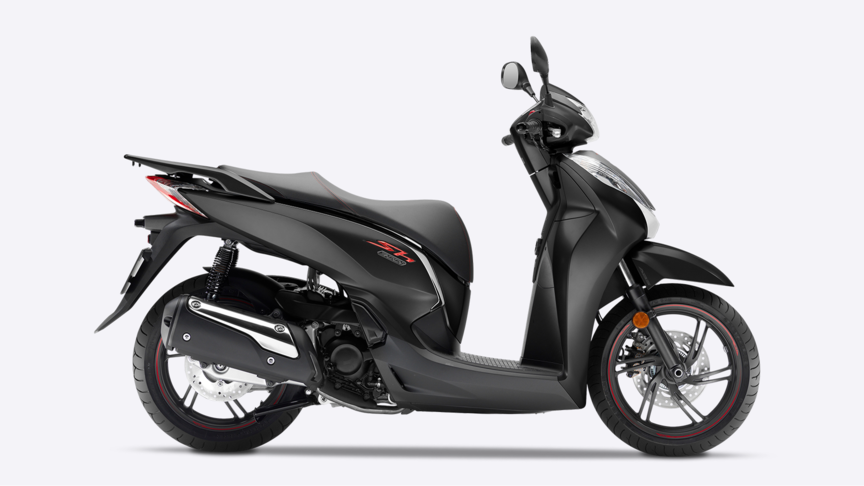 Front three-quarter facing Honda SH300i with top box and windshield.