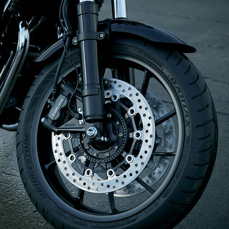 Close up of Honda CB1100 RS wheel and brake discs.