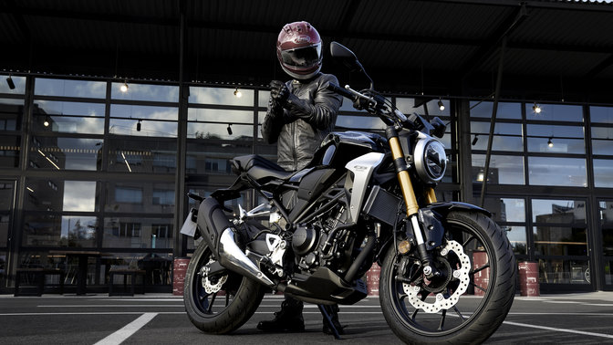 Side view of Honda CB300R Neo Sports Café parked.