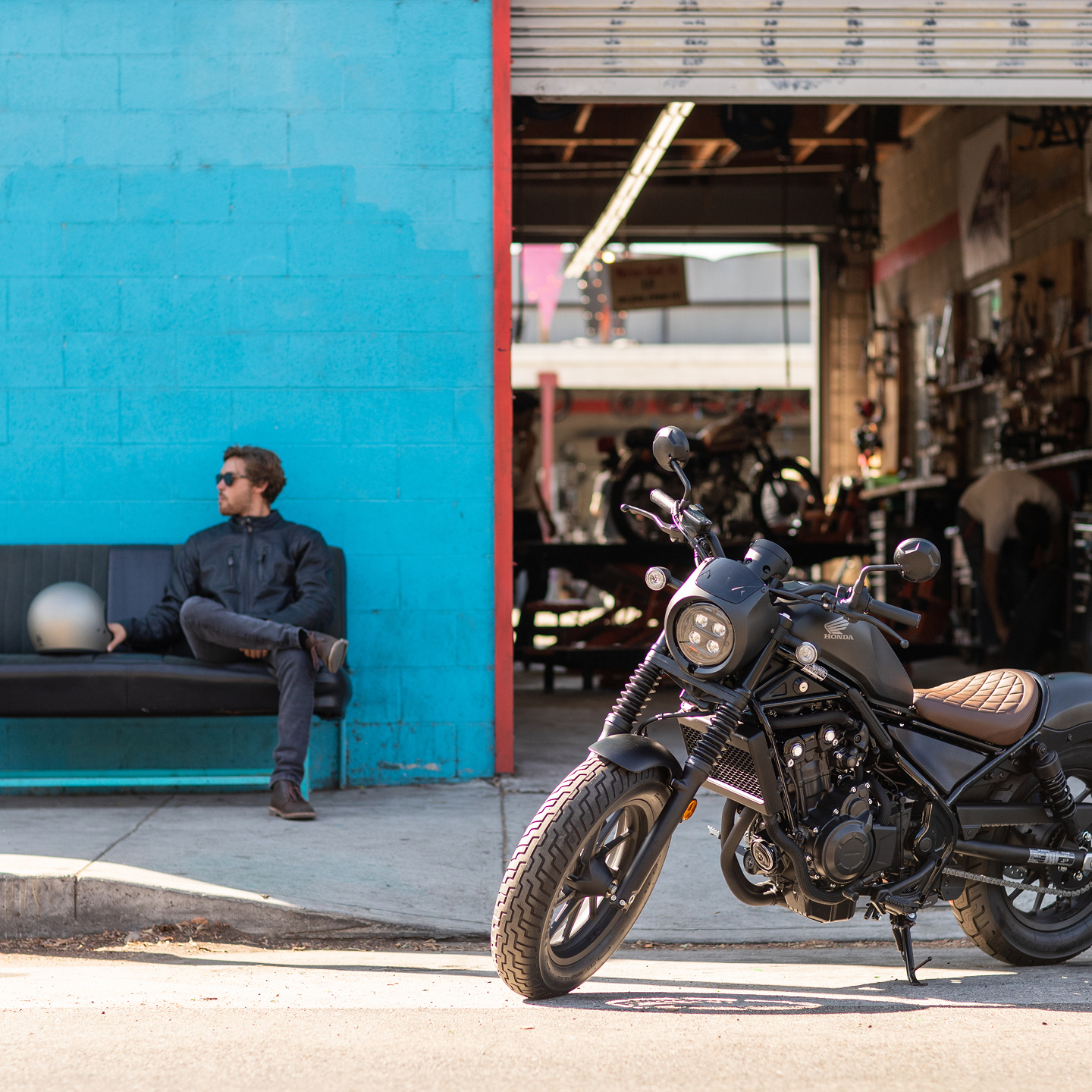 Honda CMX500 Rebel with male rider in road location. 