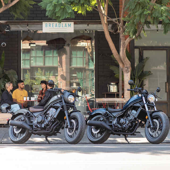 CMX500 Rebel side on shot infront of cafe.