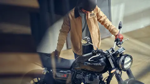 GB350S front ¾ shot with male rider at café location