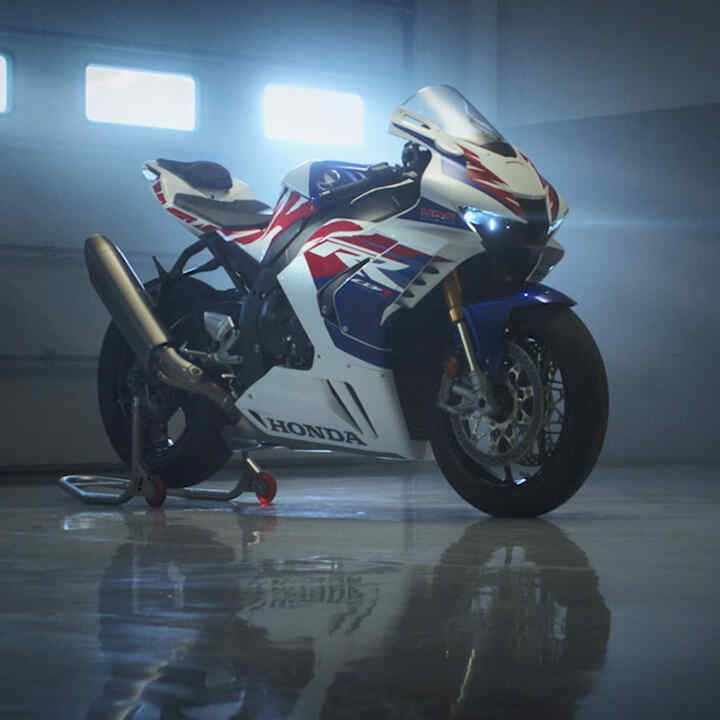 Honda CBR1000RR-R Fireblade with a rider on a race track