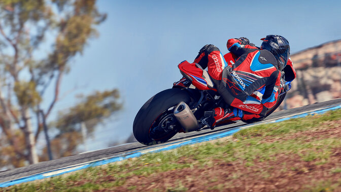 Rear facing rider on Honda CBR1000rr-r Fireblade on the race track.