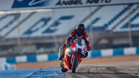 Front 3/4 facing static Honda CBR1000rr-r Fireblade on the track.