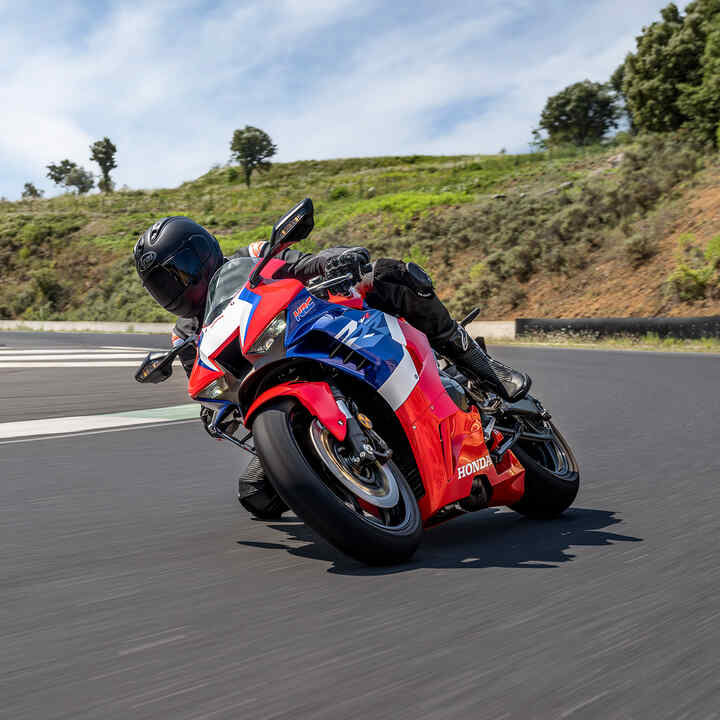 Honda CBR1000RR-R Fireblade coming out of bend on track