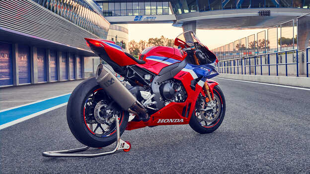 Rear facing Honda CBR1000rr-r Fireblade on track showcasing Akrapovič Titanium Muffler.