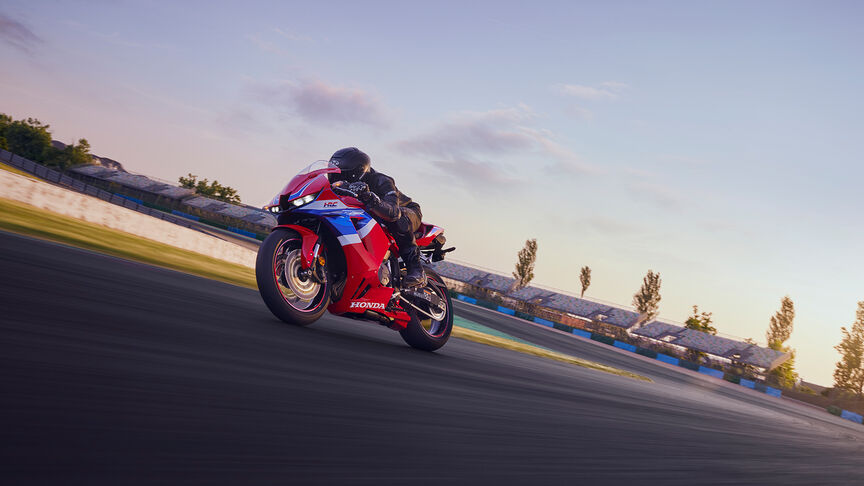 CBR600RR static image in garage on-track.