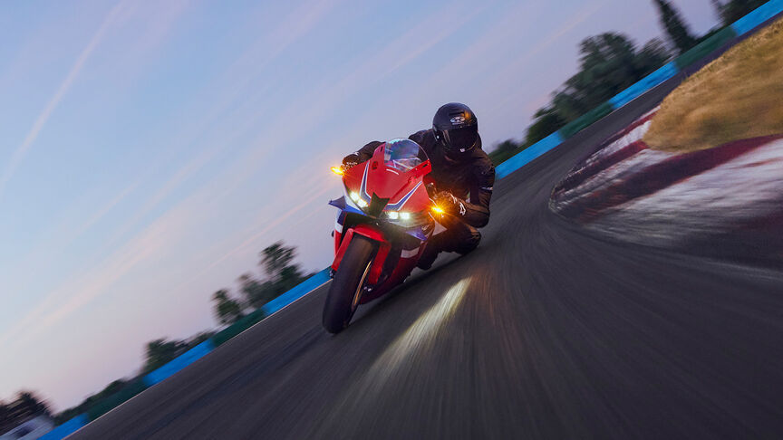 CBR600RR static image in garage on-track.