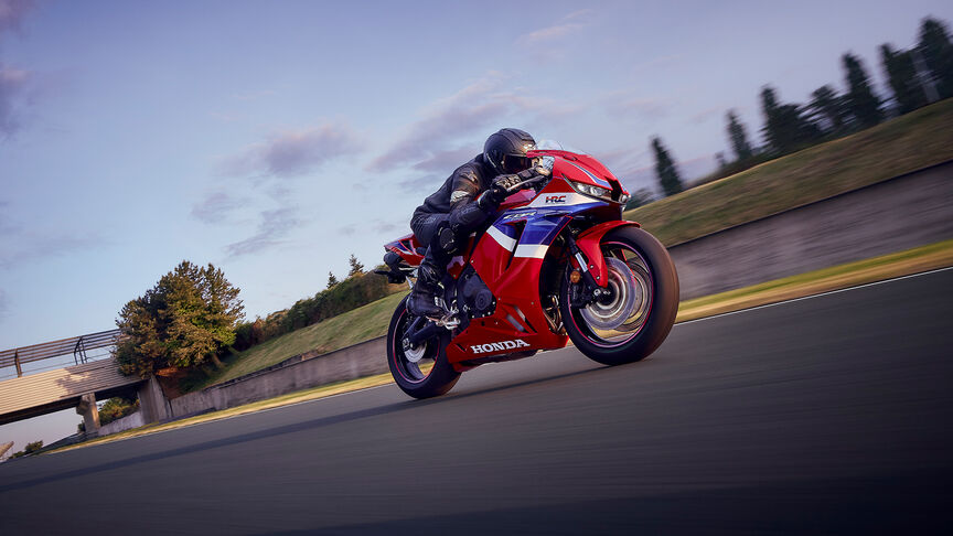 CBR600RR static image in garage on-track.