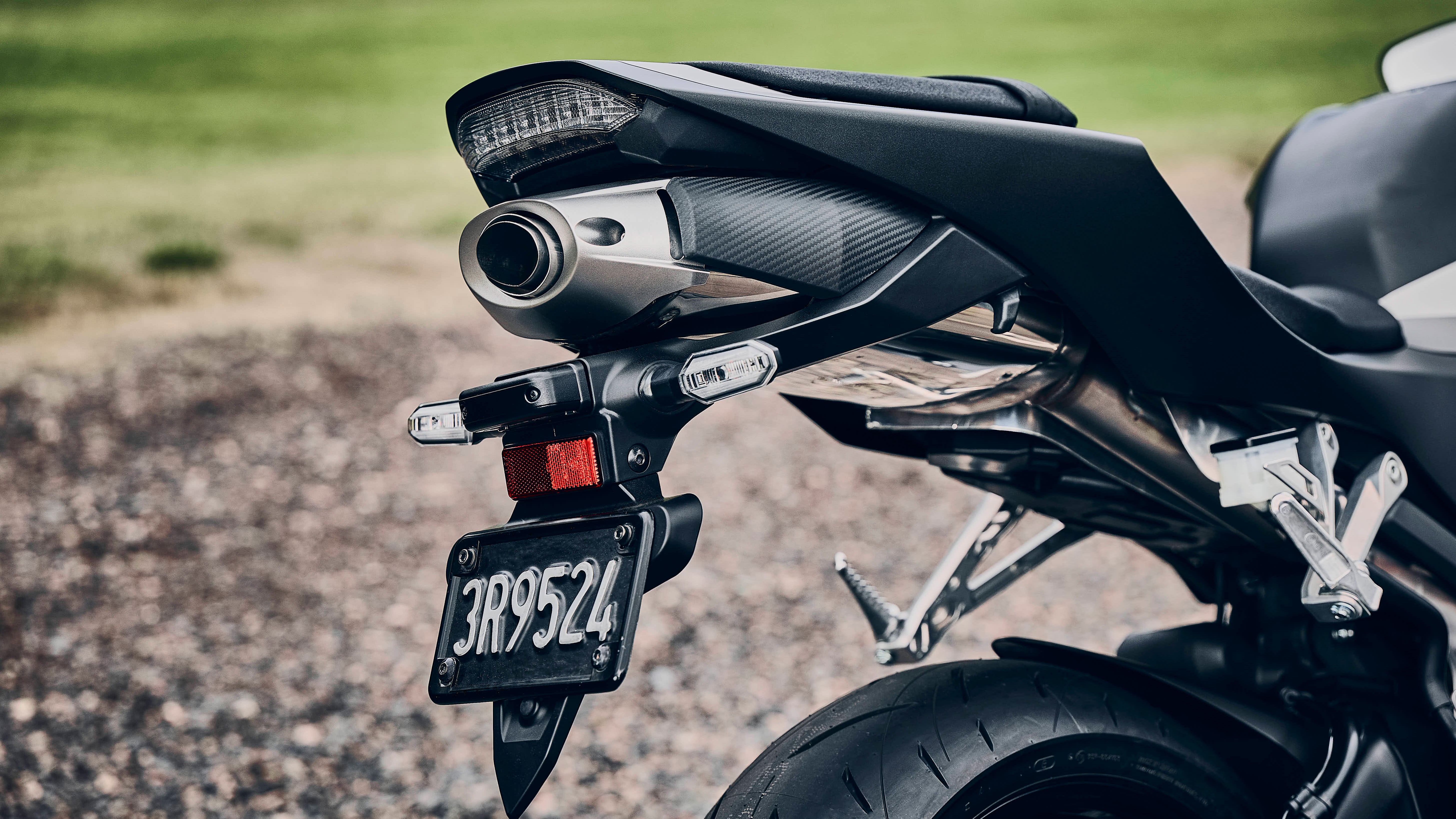 CBR600RR handlebar rider view close-up.