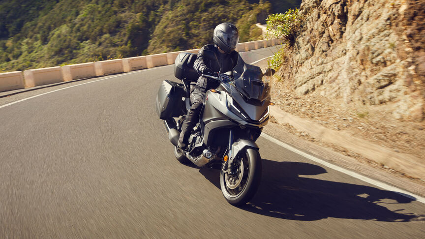Honda NT1100 highlighting wind protection and compact dimensions.
