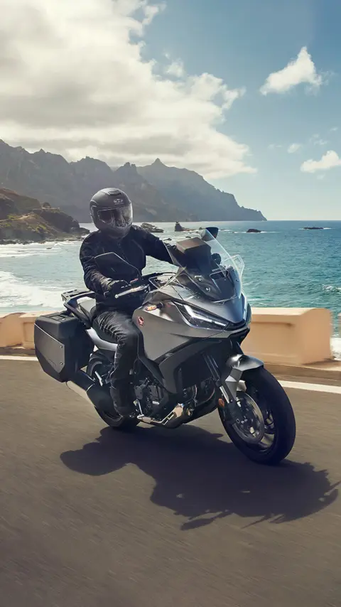 Honda NT1100 riding on coastal road