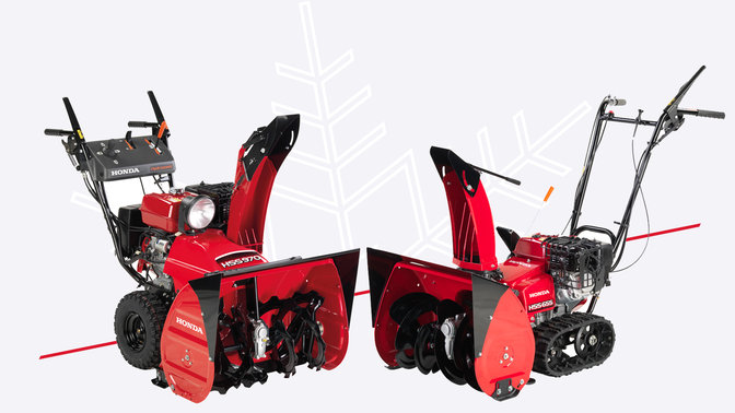 2x Honda Snowthrowers, three-quarter facing.
