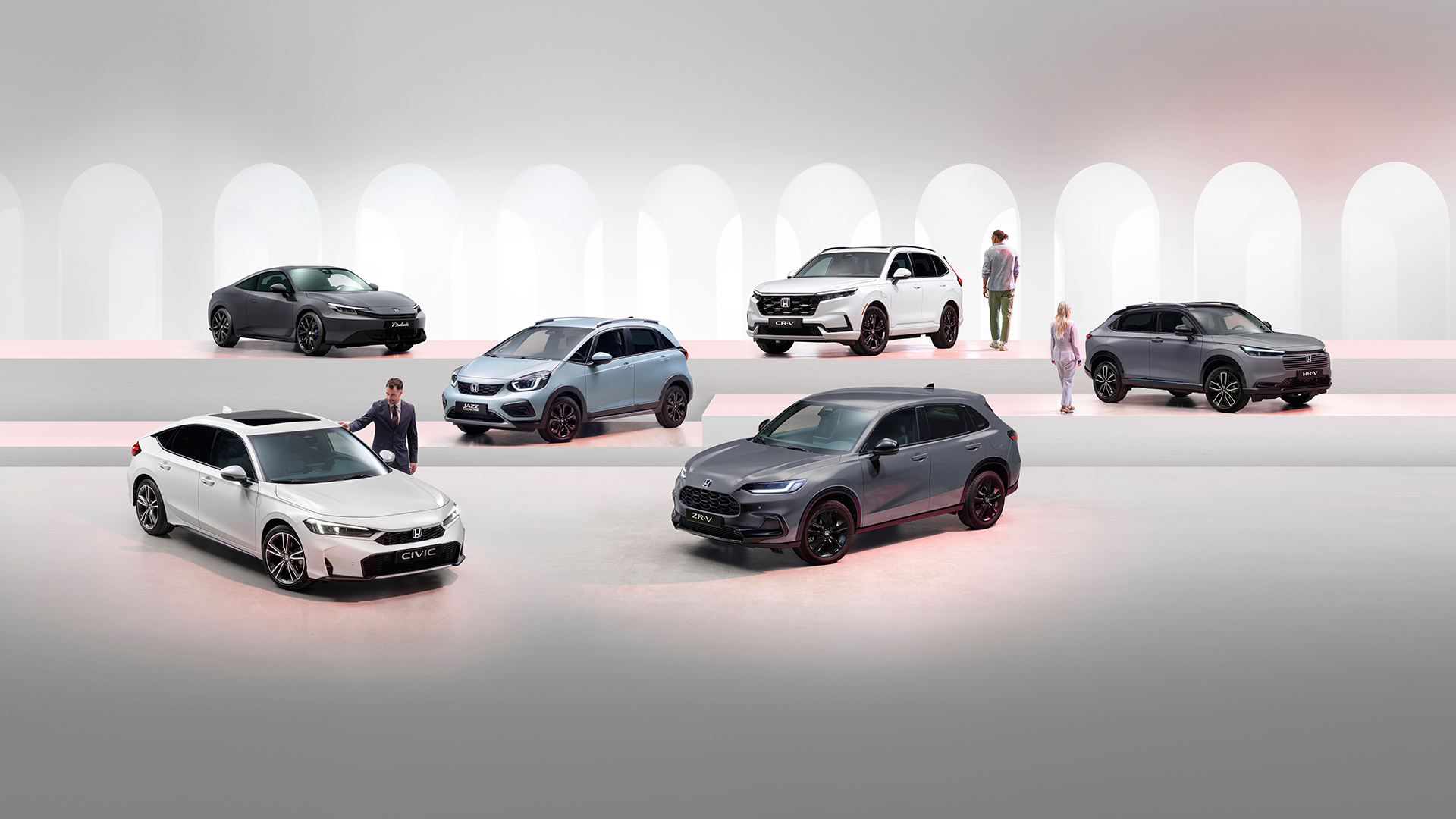Honda electrified range including a grey Prelude, white CR-V, grey HR-V, white Jazz, grey ZR-V, and white Civic.