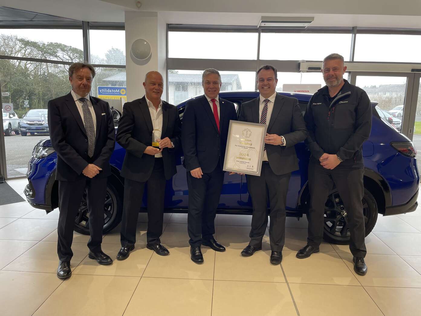 Honda dealership with Yushu award.