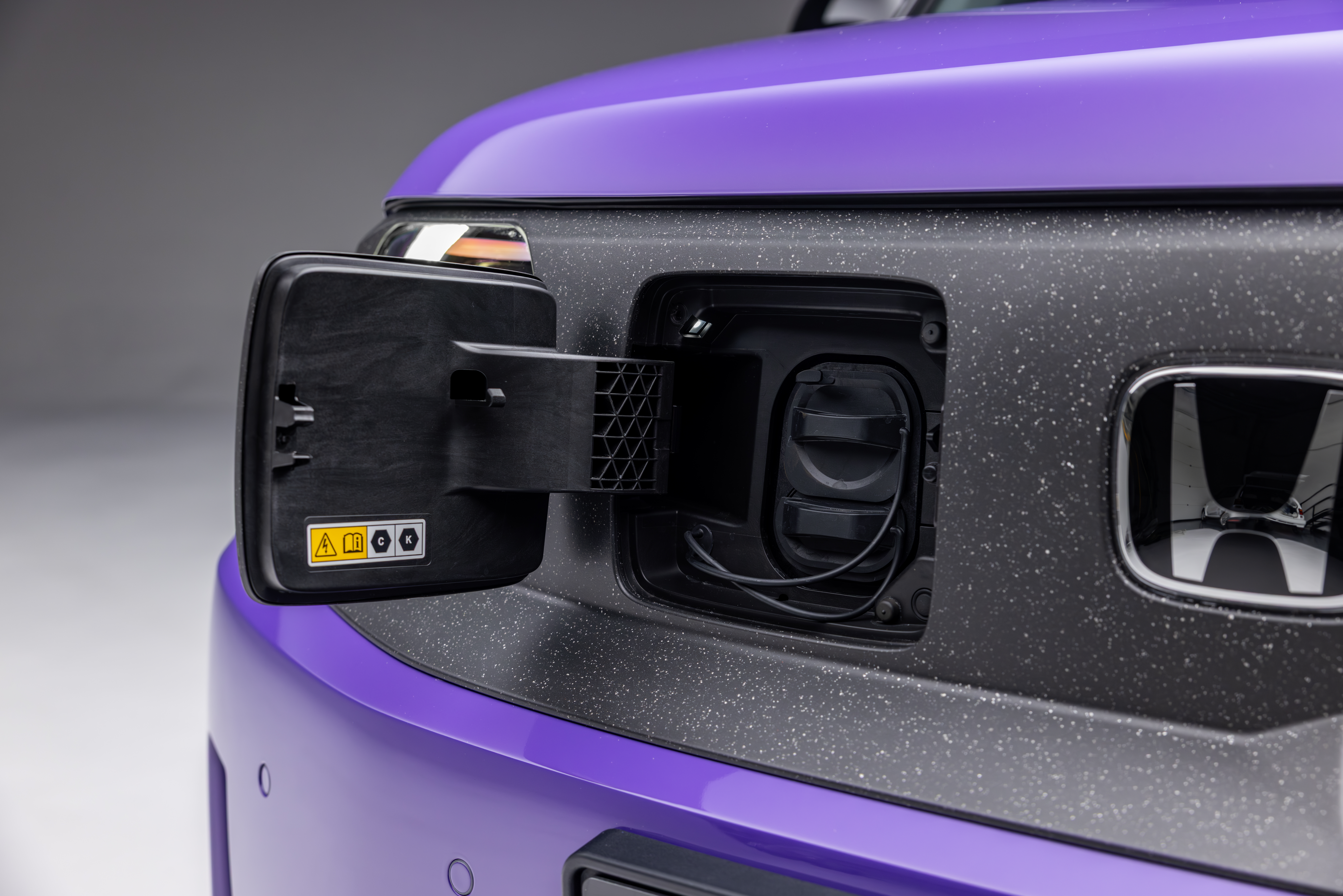 Honda Super-N charging port on the front of the car, to the left of the logo