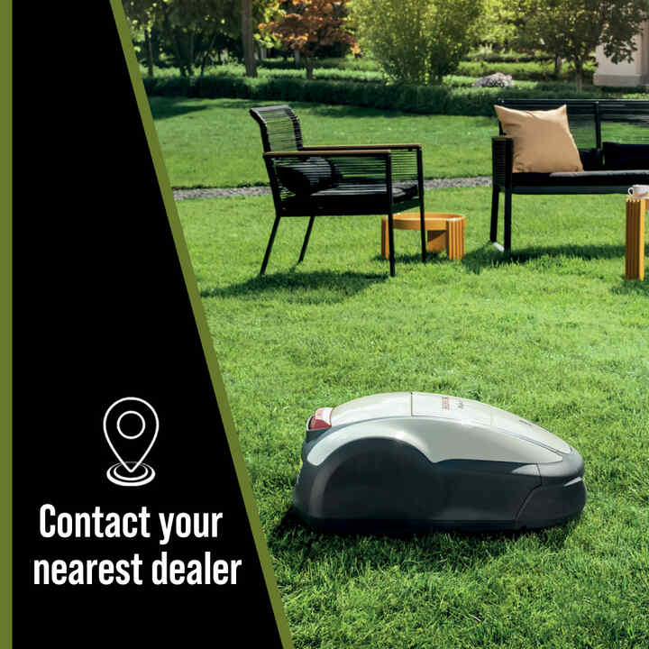 Contact a dealer logo and Honda Miimo on grass with people in the background