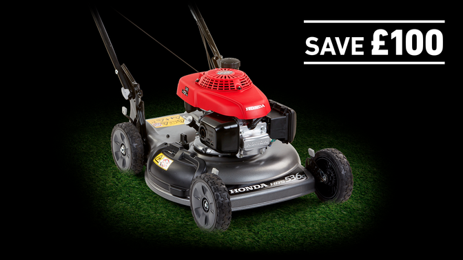 HRS lawnmower on grass in a dark background with save £100