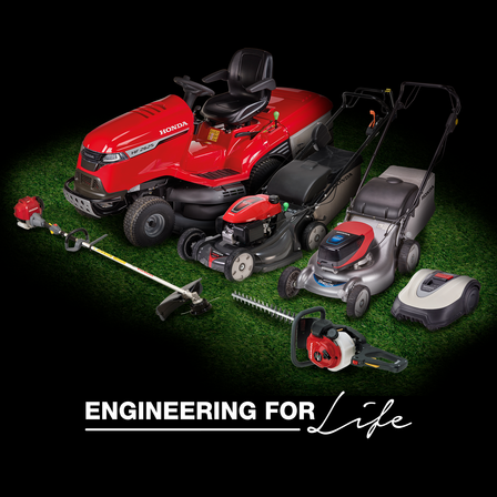 Ride on tractor, honda petrol mower, lawnmower, miimo, hedgetrimmer and brushcutter on grass on a black background