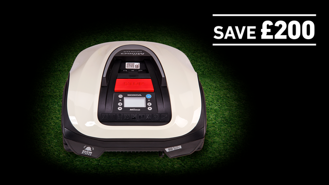 HRM40 live on grass in a dark background with save £200