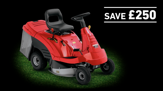 Honda Ride-On mower on grass in a dark background with save £250
