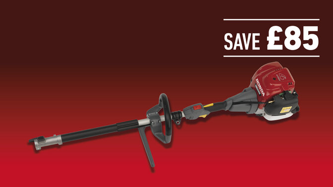 Versatool on grass on a dark background with save £85