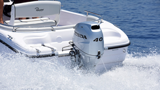 Honda Marine outboard engine on the back of a Ranieri boat