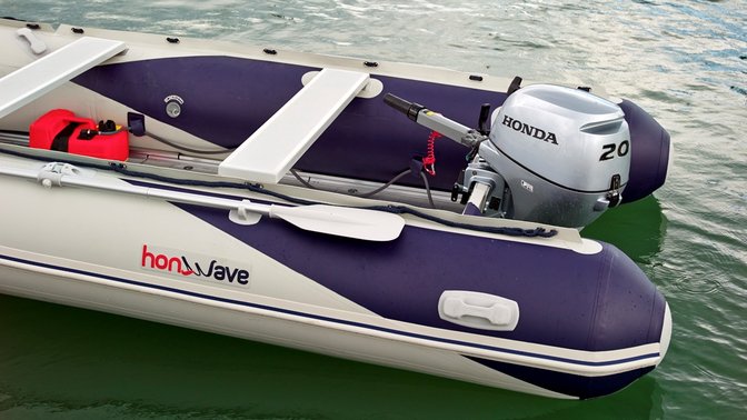 side view of honwave inflatable boat fitted with honda 20 horsepower outboard engine