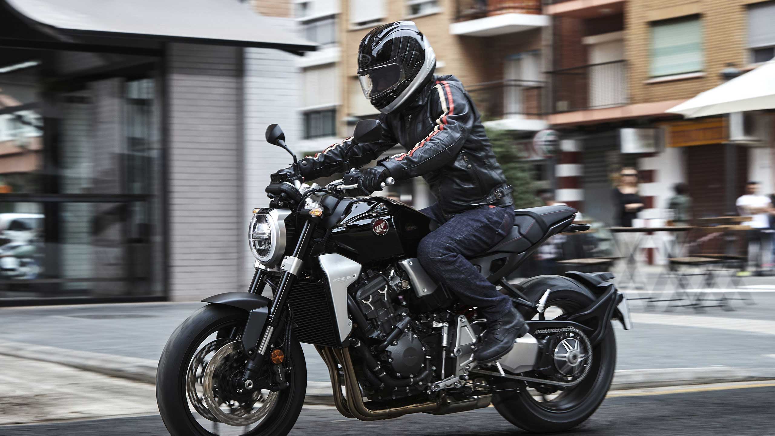 honda cb1000r neo sports cafe with rider side view