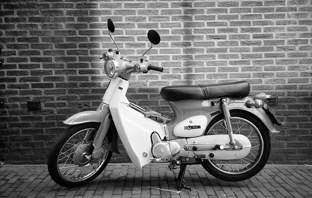 original honda super cub black and white honda engine room