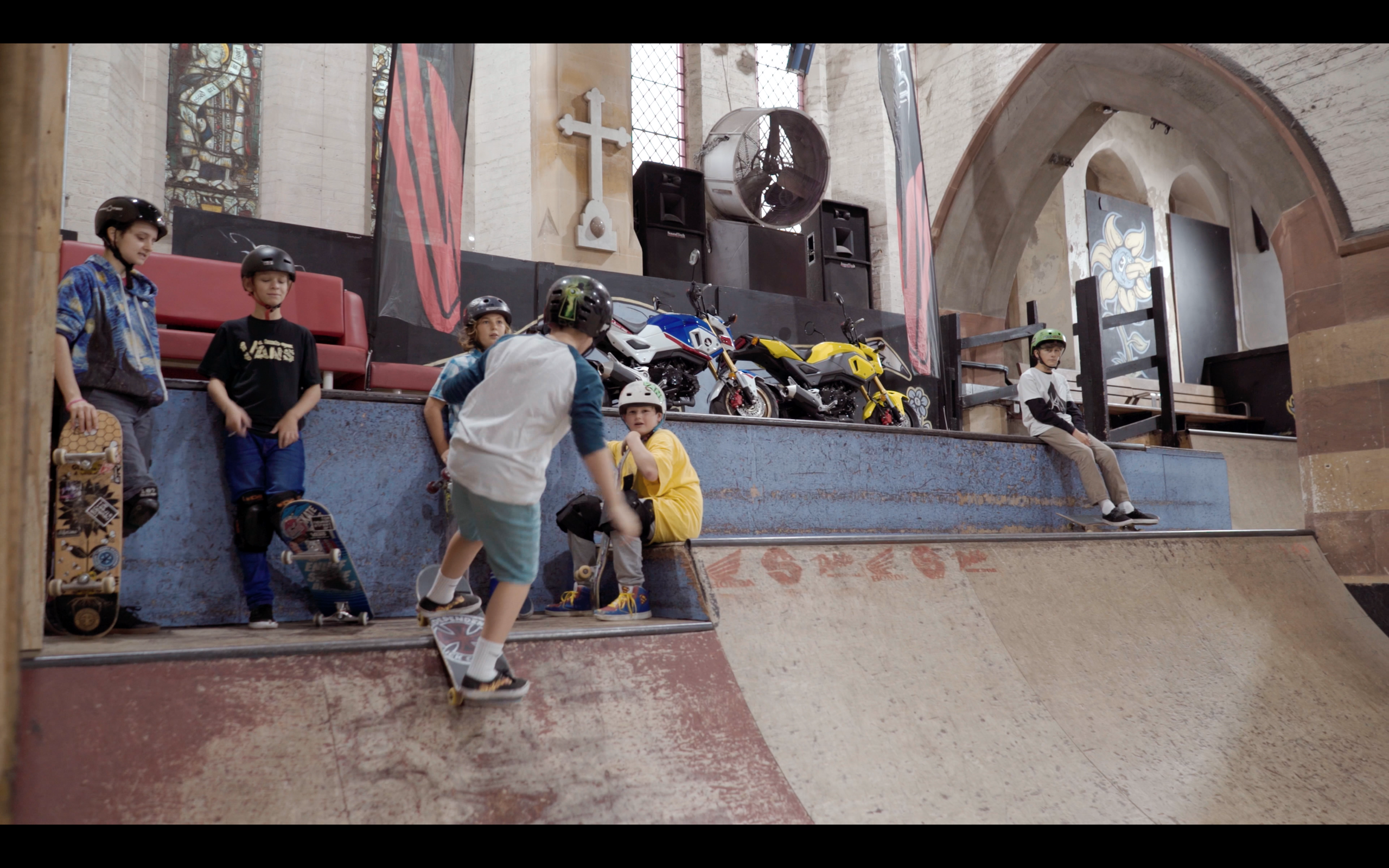 skate boarders at skaterham skate park