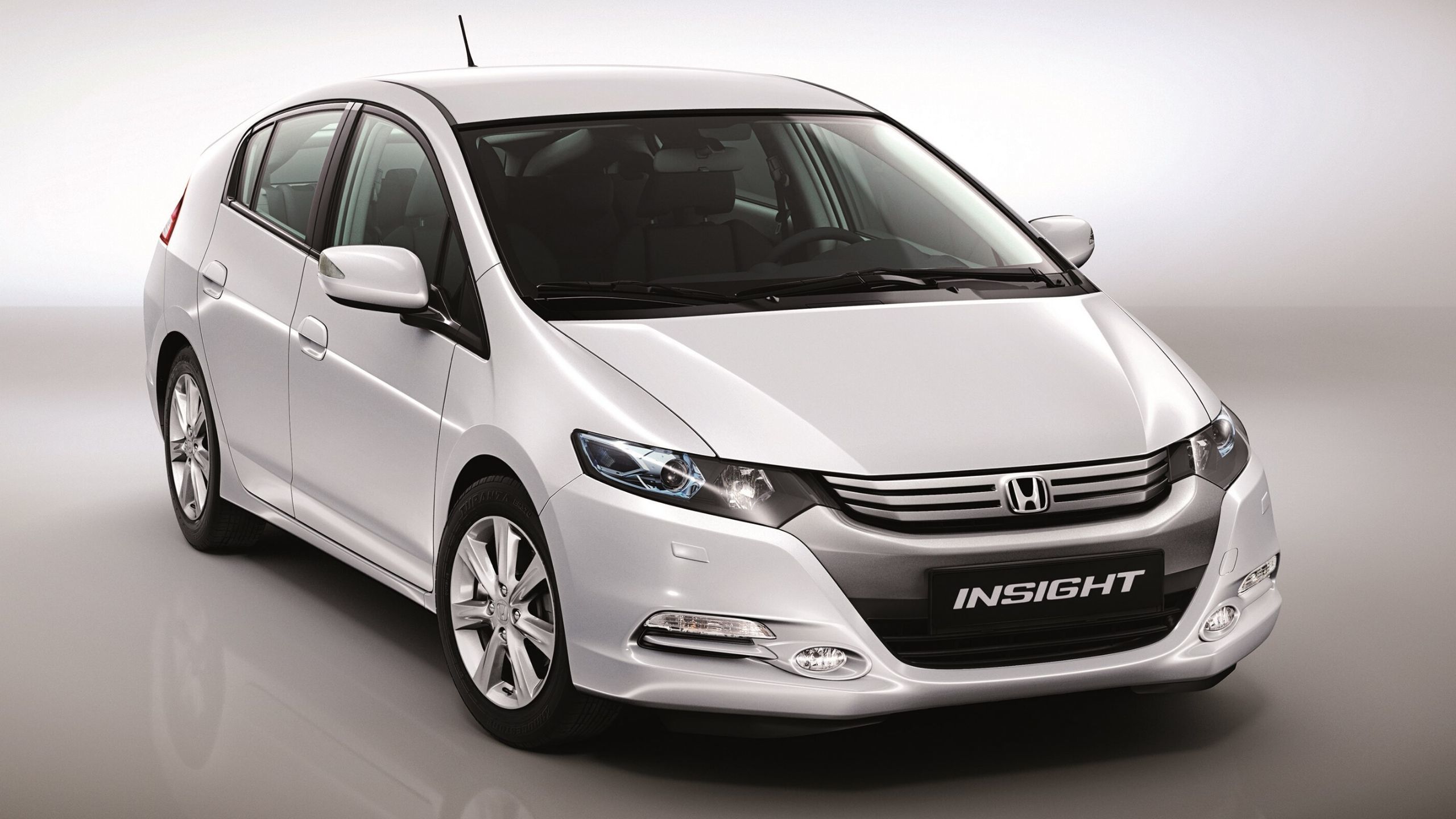 Honda ze2. Хондаинсайж 2009. Машина Honda Insight. Хонда Инсайт гибрид 2009. Honda Insight II 2010.