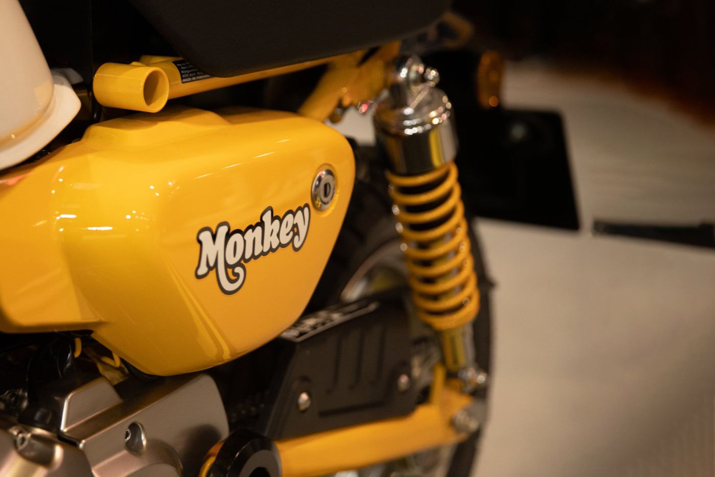 Close up of monkey logo on yellow, Honda monkey motorcycle