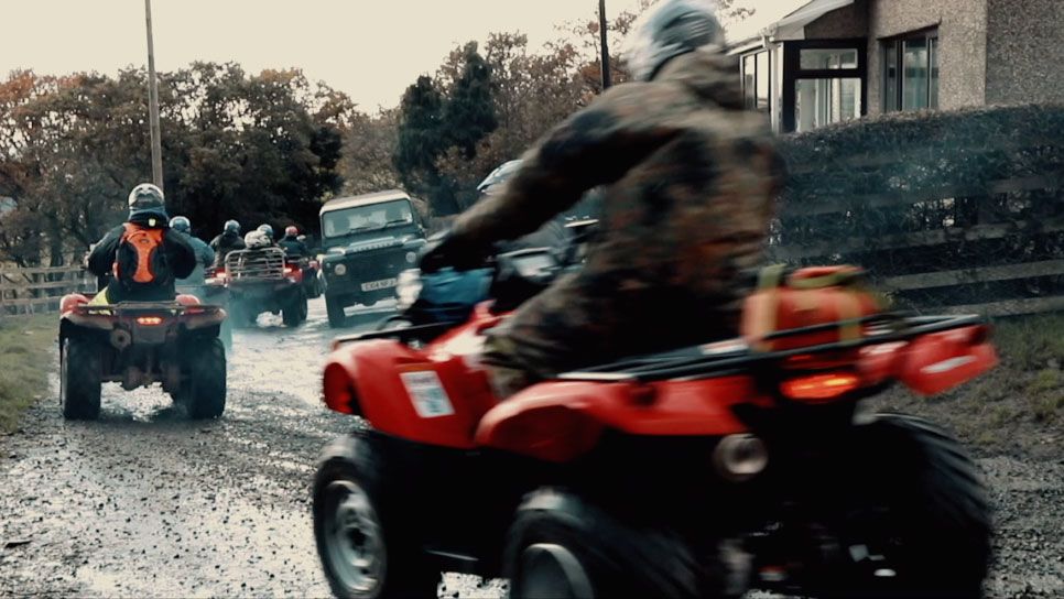 Honda ATVs in convoy